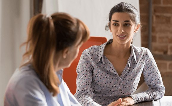 two women talking