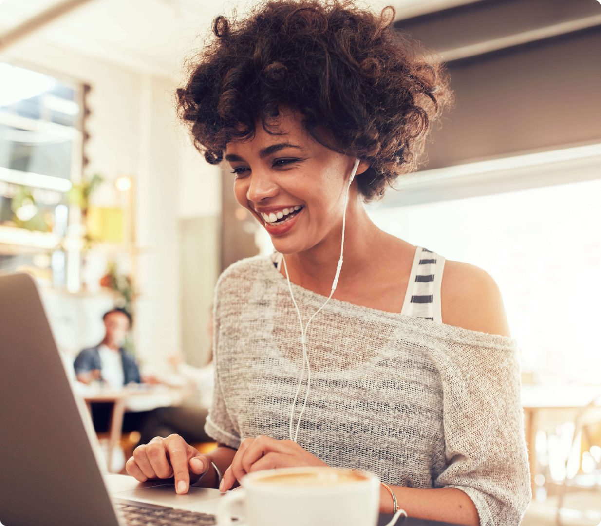 woman smiling on laptop