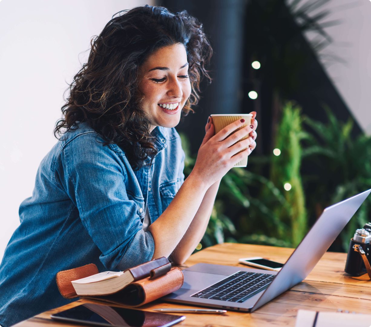 woman smiling at laptop