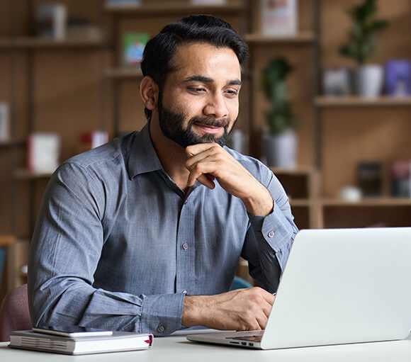 man working at laptop