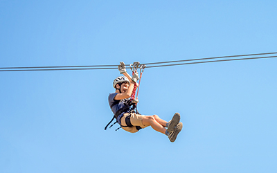 man ziplining
