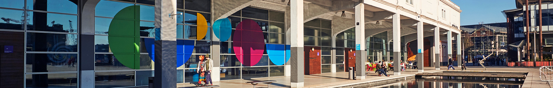 we the curious building banner