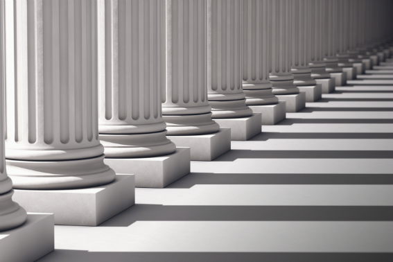 column of pillars casting shadows