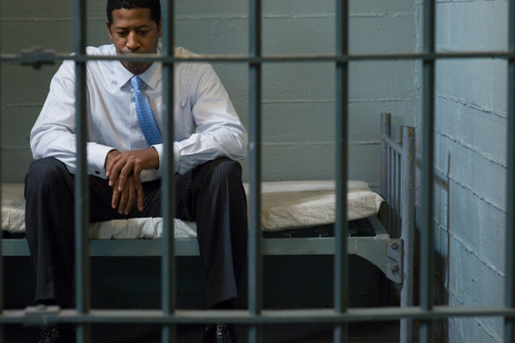 office worker sitting in cell