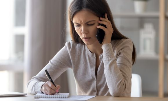 distressed woman on phone