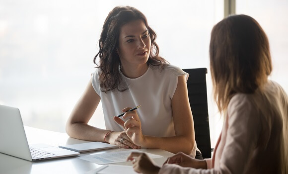 two business women having a serious conversation