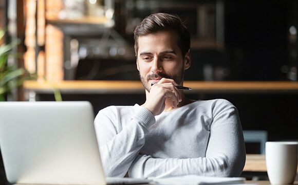 man reviewing absence policy