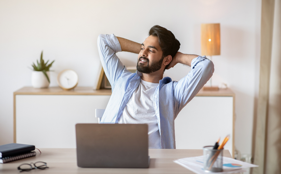 man relaxing in chair