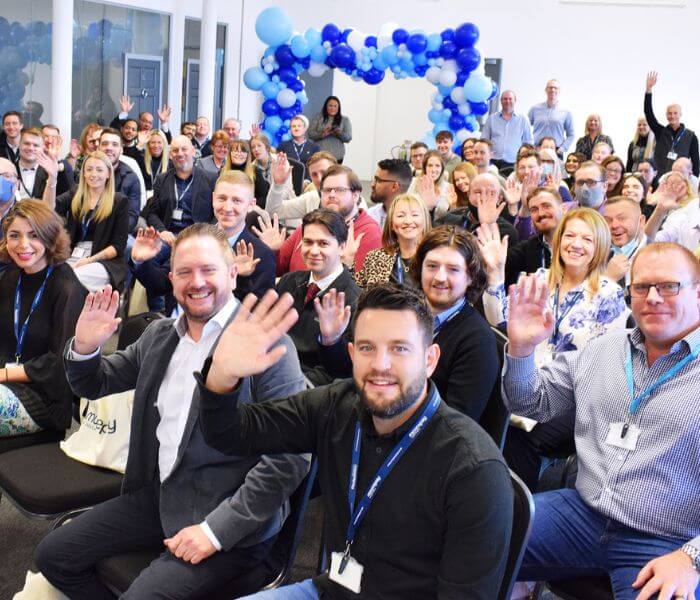 moorepay team waving