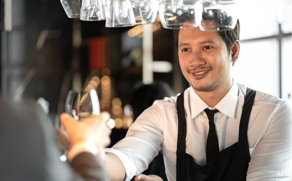 bartender serving a drink