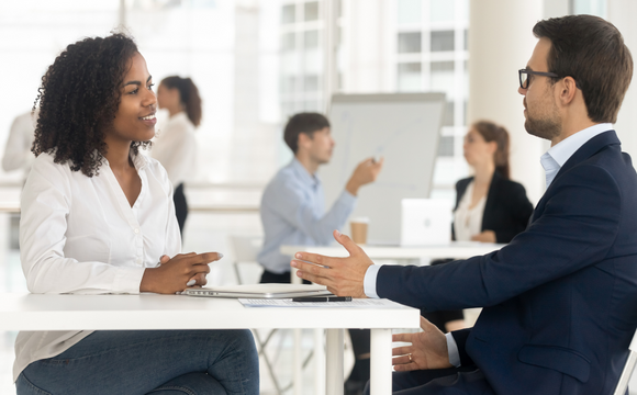 man and woman having a discussion