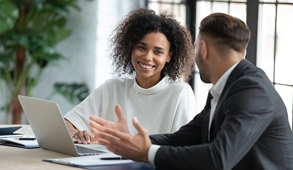 manager communication brilliantly with happy staff member