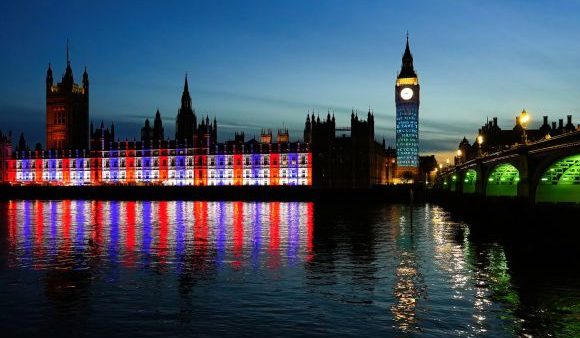 Projections on Big Ben in London to celebrate the Coronation of King Charles III - Light show on Elizabeth Tower and the Houses of Parliament in Westminster, London, United Kingdom