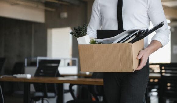man carrying box